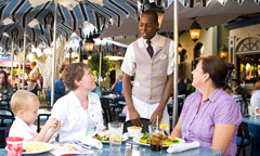 Guests Enjoying Outdoor Dining at Cafe Orleans