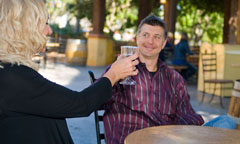 Couple Toast Glasses of Wine