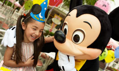Girl in Birthday Hat and Mickey