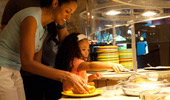 A mom and a little girl begin the buffet experience.