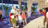 A family meets Alice and the White Rabbit.