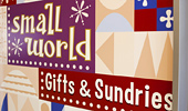 Sign: Small World Gifts & Sundries