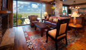 Living area with large window that frames the view.