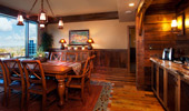 Dining table near large picture window.