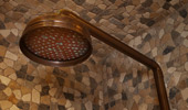 Close up on shower head.