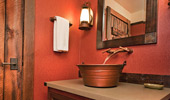 A copper-finished tub doubles as a sink.