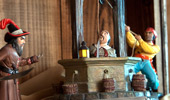 Replica of pirate dunking another in a well.