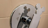 Faucet fixtures in the shape of a famous mouse.