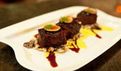 A beautifully plated meat dish