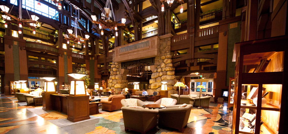 Very wide shot of the expansive lobby with fireplace and seating areas.