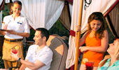 A family of 4 enjoys poolside service inside the rented cabana.