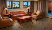 A cozy seating area with plush couches and chairs