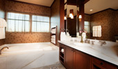White marble bath tub and counter in the Mount Whitney Suite