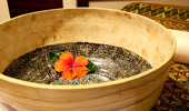 Close up on a bowl on a massage table