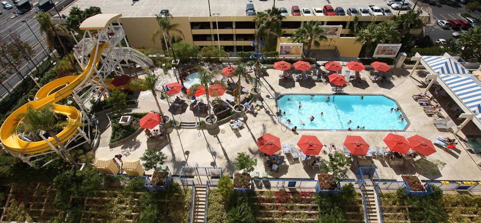An aerial view of the pool and water-slide area at Disney's Paradise Pier Hotel